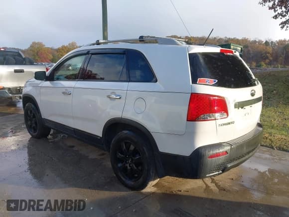 ✅ 2012 Kia Sorento LX • VIN: 5XYKTCA63CG231879 • Lot: 43668750. Listed on IAAI with 192,396 mi. Free auction sales archive from the USA and detailed vehicle history report at DreamBid. Image 3.