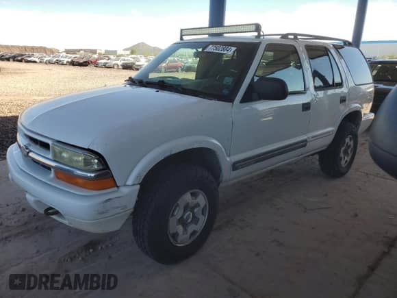 2003 Chevrolet Blazer LS z VIN 1GNDT13X63K170628, wystawiony jako Copart lot #77502884 z przebiegiem Nie podano mil oraz Czysty tytuł • Clean title. Historia ofert i sprzedaży dostępna na DreamBid. Obrazek 1.