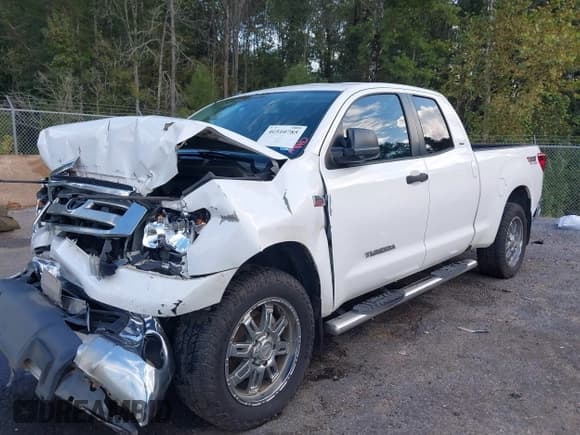 ✅ 2013 Toyota Tundra • VIN: 5TFUW5F1XDX292721 • Лот: 40510785. Опубликован ранее на IAAI с пробегом 185 445 миль. Бесплатный доступ к архиву аукционных продаж из США и подробный отчёт об истории автомобиля на DreamBid. Изображение 18.