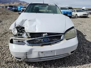 ✅ 2007 Ford Focus S • VIN: 1FAHP34N07W194709 • Lot: 86145735. Wystawiony na Copart z przebiegiem 169 530 mil. Bezpłatny archiwum sprzedaży aukcyjnych z USA i szczegółowy raport historii pojazdu na DreamBid. Zdjęcie 5.