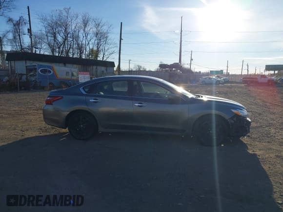 ✅ 2018 Nissan Altima SL • VIN: 1N4AL3AP4JC244524 • Lot: 43740058. Listed on IAAI with 95,833 mi. Free auction sales archive from the USA and detailed vehicle history report at DreamBid. Image 13.