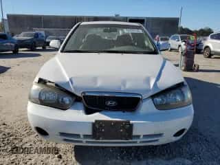 2003 Hyundai Elantra GLS z VIN KMHDN45D13U521386, wystawiony jako Copart lot #75726144 z przebiegiem 169 663 mil mil oraz Szkoda całkowita • Salvage title. Historia ofert i sprzedaży dostępna na DreamBid. Obrazek 5.