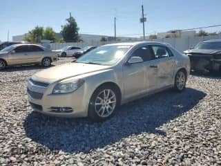 2012 Chevrolet Malibu LTZ 1LZ with VIN 1G1ZE5E02CF180672, listed as a Copart auction lot 86607385 with 134,309 mi miles and Salvage title. Bid and sale history available at DreamBid. Image 1.