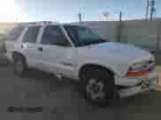 2003 Chevrolet Blazer LS z VIN 1GNDT13X33K136937, wystawiony jako Copart lot #80944284 z przebiegiem 163 549 mil mil oraz Szkoda całkowita • Salvage title. Historia ofert i sprzedaży dostępna na DreamBid. Obrazek 4.