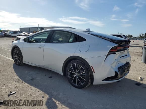 ✅ 2023 Toyota Prius LE • VIN: JTDACAAU6P3008082 • Lot: 69841073. Listed on Copart with 1,189 mi. Free auction sales archive from the USA and detailed vehicle history report at DreamBid. Image 2.