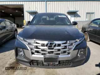 2024 Hyundai Santa Cruz SEL z VIN 5NTJBDAE0RH081096, wystawiony jako Copart lot #75926144 z przebiegiem 9 702 mil mil oraz Szkoda całkowita • Salvage title. Historia ofert i sprzedaży dostępna na DreamBid. Obrazek 5.