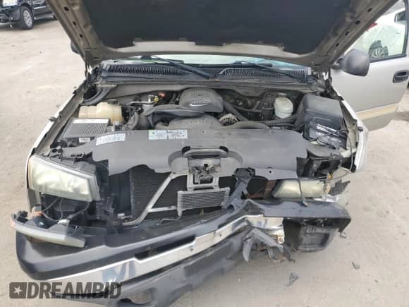 2004 Chevrolet Silverado 1500 LS z VIN 1GCEC14T54E186571, wystawiony jako Copart lot #60991645 z przebiegiem 308 569 mil mil oraz Szkoda całkowita • Salvage title. Historia ofert i sprzedaży dostępna na DreamBid. Obrazek 11.