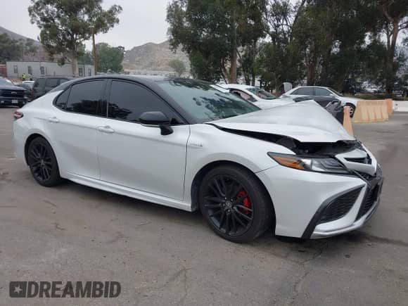 2021 Toyota Camry Hybrid XSE with VIN 4T1K31AK6MU020821, listed as a IAAI auction lot 42283548 with 61,171 mi miles and . Bid and sale history available at DreamBid. Image 1.