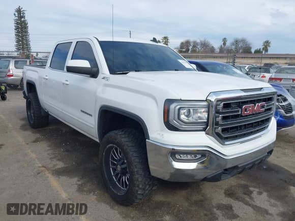 ✅ 2018 GMC Sierra 1500 SLE • VIN: 3GTU2MEC8JG590323 • Лот: 41613699. Опубликован ранее на IAAI с пробегом 45 951 миль. Бесплатный доступ к архиву аукционных продаж из США и подробный отчёт об истории автомобиля на DreamBid. Изображение 1.