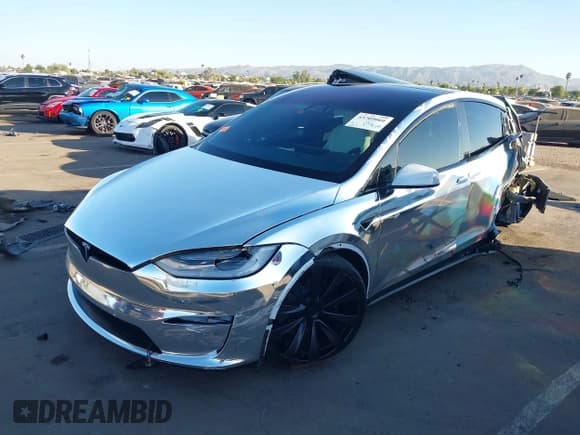 ✅ 2022 Tesla Model X Plaid • VIN: 7SAXCBE68NF331760 • Lot: 43709060. Wystawiony na IAAI z przebiegiem 30 523 mil. Bezpłatny archiwum sprzedaży aukcyjnych z USA i szczegółowy raport historii pojazdu na DreamBid. Zdjęcie 2.
