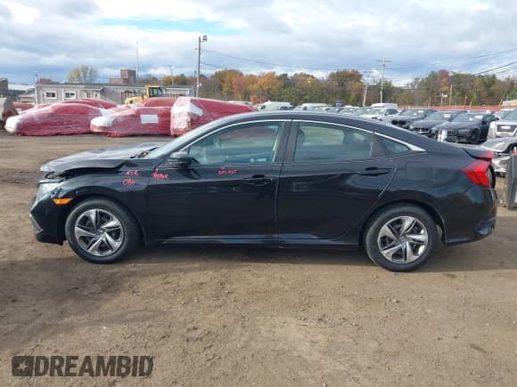 ✅ 2019 Honda Civic LX • VIN: 2HGFC2F68KH511559 • Lot: 43460821. Listed on IAAI with 64,419 mi. Free auction sales archive from the USA and detailed vehicle history report at DreamBid. Image 18.