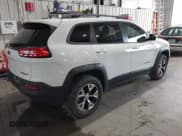 ✅ 2017 Jeep Cherokee Trailhawk • VIN: 1C4PJMBS5HW614956 • Лот: 42079991. Опубликован ранее на IAAI с пробегом 143 378 миль. Бесплатный доступ к архиву аукционных продаж из США и подробный отчёт об истории автомобиля на DreamBid. Изображение 4.