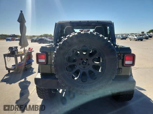 ✅ 2023 Jeep Wrangler Sport • VIN: 1C4HJXDG8PW510541 • Lot: 87301695. Listed on Copart with 21,756 mi. Free auction sales archive from the USA and detailed vehicle history report at DreamBid. Image 6.