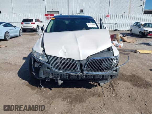 ✅ 2016 Lincoln MKT EcoBoost • VIN: 2LMHJ5AT0GBL00877 • Lot: 41722584. Listed on IAAI with 148,585 mi. Free auction sales archive from the USA and detailed vehicle history report at DreamBid. Image 6.