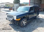 ✅ 2010 Jeep Commander Sport • VIN: 1J4RG4GK0AC157281 • Lot: 42581215. Listed on IAAI with 202,014 mi. Free auction sales archive from the USA and detailed vehicle history report at DreamBid. Image 2.