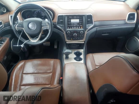 ✅ 2015 Jeep Grand Cherokee Summit • VIN: 1C4RJFJG6FC779415 • Lot: 84226075. Listed on Copart with 284,795 mi. Free auction sales archive from the USA and detailed vehicle history report at DreamBid. Image 8.