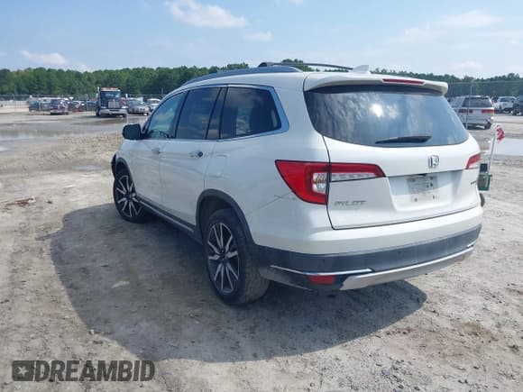 ✅ 2019 Honda Pilot Touring 8-Passenger • VIN: 5FNYF5H9XKB001842 • Lot: 43026784. Listed on IAAI with 114,674 mi. Free auction sales archive from the USA and detailed vehicle history report at DreamBid. Image 3.