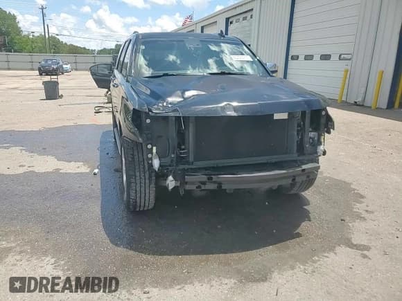 ✅ 2015 Chevrolet Tahoe LTZ • VIN: 1GNSCCKC3FR633581 • Lot: 65729215. Listed on Copart with 135,551 mi. Free auction sales archive from the USA and detailed vehicle history report at DreamBid. Image 15.