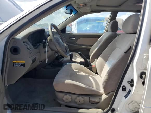 2002 Hyundai Sonata z VIN KMHWF25S82A665767, wystawiony jako Copart lot #77455604 z przebiegiem 38 138 mil mil oraz Nie do naprawy • Non repairable. Historia ofert i sprzedaży dostępna na DreamBid. Obrazek 7.