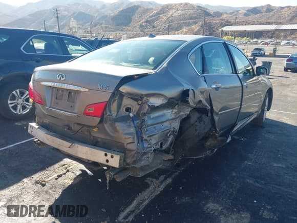 ✅ 2010 Infiniti M • VIN: JN1CY0AP1AM911971 • Lot: 43346869. Listed on IAAI with Not provided. Free auction sales archive from the USA and detailed vehicle history report at DreamBid. Image 4.