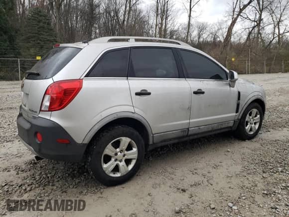 2014 Chevrolet Captiva Sport LS z VIN 3GNAL2EK6ES674243, wystawiony jako Copart lot #81742154 z przebiegiem 185 254 mil mil oraz Czysty tytuł • Clean title. Historia ofert i sprzedaży dostępna na DreamBid. Obrazek 3.