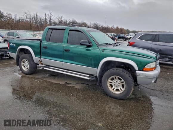 ✅ 2003 Dodge Dakota SLT • VIN: 1D7HG48N43S263578 • Lot: 94905075. Listed on Copart with 120,881 mi. Free auction sales archive from the USA and detailed vehicle history report at DreamBid. Image 4.