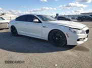 ✅ 2015 BMW 6 Series 650i • VIN: WBA6B2C57FGB99328 • Lot: 92264175. Listed on Copart with 80,043 mi. Free auction sales archive from the USA and detailed vehicle history report at DreamBid. Image 4.