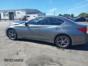 ✅ 2015 Infiniti Q50 Premium • VIN: JN1BV7AR3FM415818 • Lot: 43250031. Listed on IAAI with 94,318 mi. Free auction sales archive from the USA and detailed vehicle history report at DreamBid. Image 14.