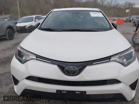 ✅ 2018 Toyota RAV4 LE • VIN: JTMBFREV7JJ214074 • Lot: 43688130. Listed on IAAI with 127,167 mi. Free auction sales archive from the USA and detailed vehicle history report at DreamBid. Image 12.