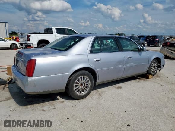 ✅ 2004 Cadillac DeVille DHS • VIN: 1G6KE54Y74U220213 • Lot: 64277385. Listed on Copart with 142,344 mi. Free auction sales archive from the USA and detailed vehicle history report at DreamBid. Image 3.