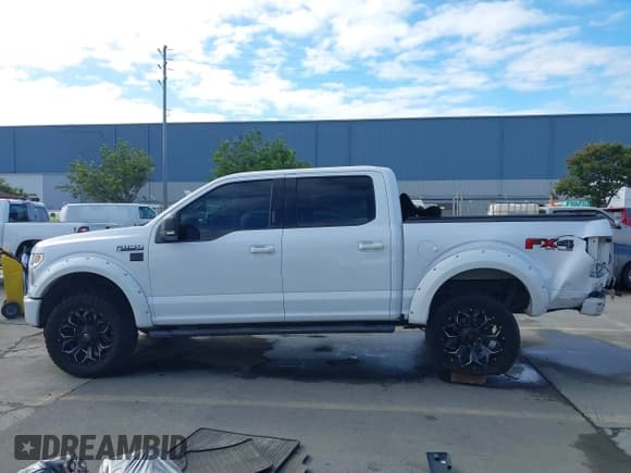 ✅ 2015 Ford F-150 XLT • VIN: 1FTEW1EF7FKE43105 • Lot: 43726698. Listed on IAAI with 149,652 mi. Free auction sales archive from the USA and detailed vehicle history report at DreamBid. Image 14.