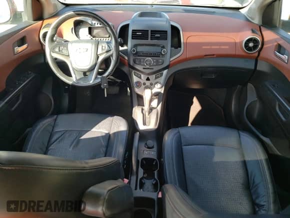 2012 Chevrolet Sonic LTZ с VIN 1G1JE5SH3C4149210, выставлен на аукционе Copart как лот 61470005 с пробегом 166 902 миль миль и Списание • Salvage title. История ставок и продаж доступна на DreamBid. Изображение 8.