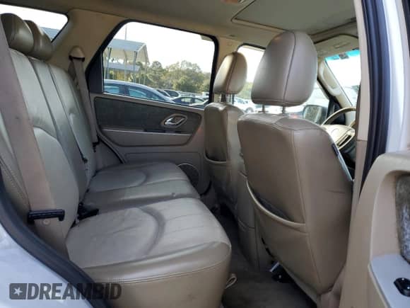 2006 Mercury Mariner Luxury с VIN 4M2CU56176DJ03331, выставлен на аукционе Copart как лот 83557274 с пробегом 291 468 миль миль и Списание • Salvage title. История ставок и продаж доступна на DreamBid. Изображение 11.