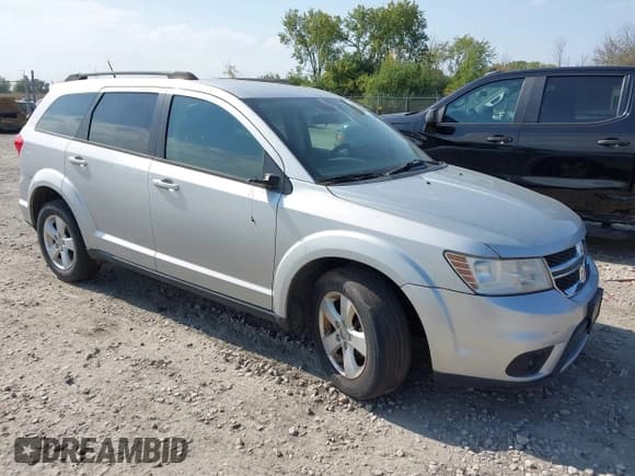 ✅ 2011 Dodge Journey Mainstreet • VIN: 3D4PH1FG6BT559384 • Lot: 43358618. Listed on IAAI with 148,054 mi. Free auction sales archive from the USA and detailed vehicle history report at DreamBid. Image 1.