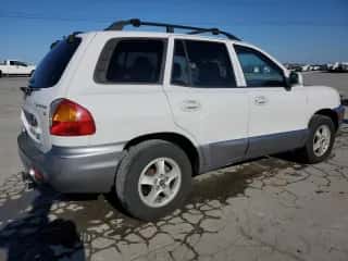 2002 Hyundai Santa Fe GLS с VIN KM8SC13DX2U329705, выставлен на аукционе Copart как лот 48986355 с пробегом 118 502 миль миль и Списание • Salvage title. История ставок и продаж доступна на DreamBid. Изображение 3.