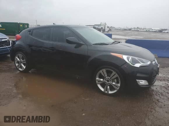 2017 Hyundai Veloster z VIN KMHTC6AD1HU313051, wystawiony jako Copart lot #82075395 z przebiegiem 69 415 mil mil oraz Szkoda całkowita • Salvage title. Historia ofert i sprzedaży dostępna na DreamBid. Obrazek 4.