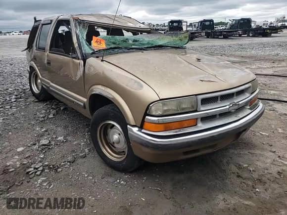 2000 Chevrolet Blazer LS с VIN 1GNCS13W6Y2155253, выставлен на аукционе Copart как лот 55951095 с пробегом 243 661 миль миль и Списание • Salvage title. История ставок и продаж доступна на DreamBid. Изображение 14.
