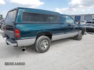✅ 1996 Dodge RAM • VIN: 1B7KC26C9TS629679 • Lot: 69828344. Listed on Copart with 198,659 mi. Free auction sales archive from the USA and detailed vehicle history report at DreamBid. Image 3.