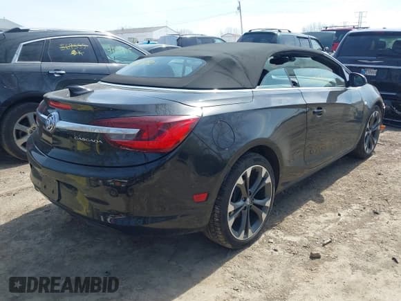 ✅ 2017 Buick Cascada Premium • VIN: W04WH3N57HG142092 • Lot: 41912901. Listed on IAAI with 59,486 mi. Free auction sales archive from the USA and detailed vehicle history report at DreamBid. Image 4.