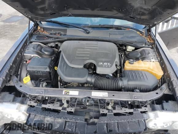 2013 Dodge Challenger SXT с VIN 2C3CDYAG7DH607756, выставлен на аукционе Copart как лот 91021985 с пробегом 162 699 миль миль и Чистый • Clean title. История ставок и продаж доступна на DreamBid. Изображение 11.