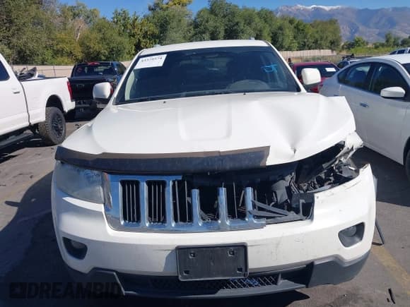 ✅ 2012 Jeep Grand Cherokee Laredo • VIN: 1C4RJFAG2CC114426 • Lot: 43379574. Wystawiony na IAAI z przebiegiem 142 210 mil. Bezpłatny archiwum sprzedaży aukcyjnych z USA i szczegółowy raport historii pojazdu na DreamBid. Zdjęcie 12.