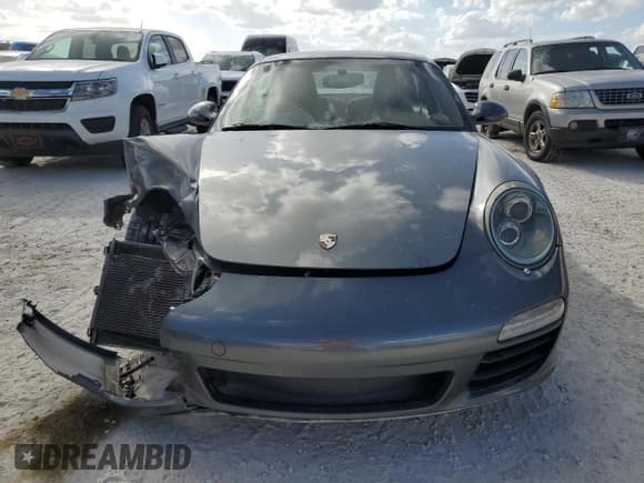 ✅ 2011 Porsche 911 Carrera S • VIN: WP0AB2A97BS720331 • Lot: 77250564. Wystawiony na Copart z przebiegiem 79 985 mil. Bezpłatny archiwum sprzedaży aukcyjnych z USA i szczegółowy raport historii pojazdu na DreamBid. Zdjęcie 5.