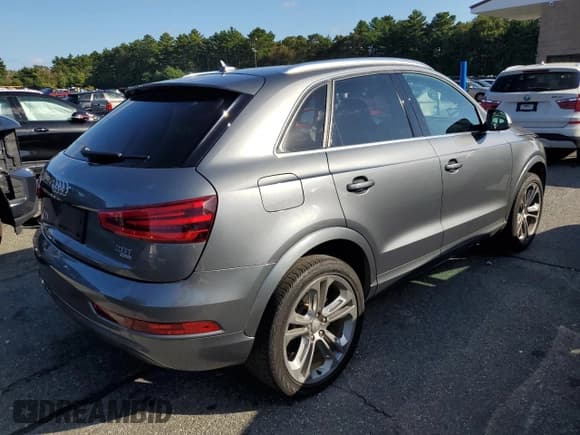 ✅ 2015 Audi Q3 Premium Plus • VIN: WA1EFCFS7FR007895 • Лот: 81276765. Опубликован ранее на Copart с пробегом 130 535 миль. Бесплатный доступ к архиву аукционных продаж из США и подробный отчёт об истории автомобиля на DreamBid. Изображение 3.