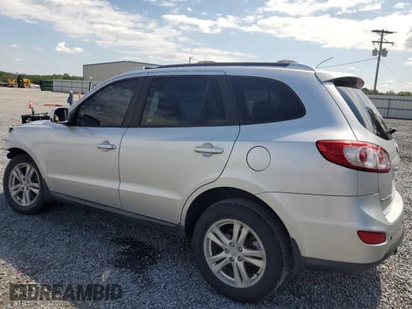 2012 Hyundai Santa Fe SE z VIN 5XYZH4AG0CG097914, wystawiony jako Copart lot #67776104 z przebiegiem 166 992 mil mil oraz Szkoda całkowita • Salvage title. Historia ofert i sprzedaży dostępna na DreamBid. Obrazek 2.