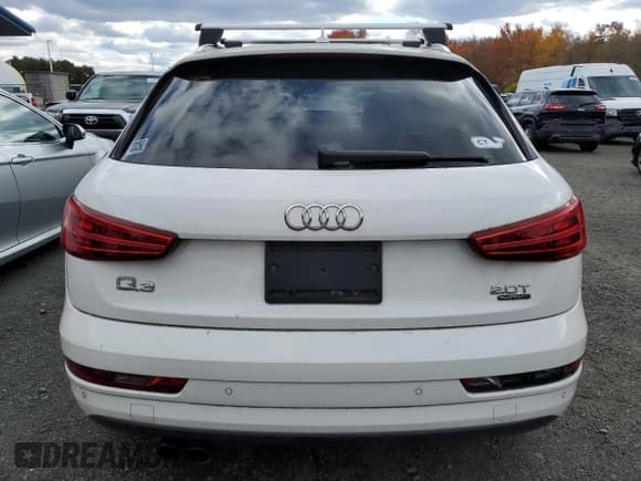 ✅ 2017 Audi Q3 Premium • VIN: WA1ECCFS2HR012885 • Lot: 89858775. Wystawiony na Copart z przebiegiem 163 259 mil. Bezpłatny archiwum sprzedaży aukcyjnych z USA i szczegółowy raport historii pojazdu na DreamBid. Zdjęcie 6.