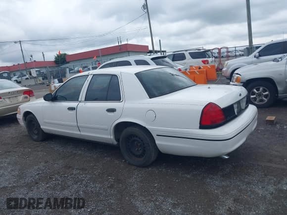 ✅ 2000 Ford Crown Victoria Police Interceptor • VIN: 2FAFP71W5YX204281 • Лот: 42533803. Опубликован ранее на IAAI с пробегом 128 268 миль. Бесплатный доступ к архиву аукционных продаж из США и подробный отчёт об истории автомобиля на DreamBid. Изображение 14.