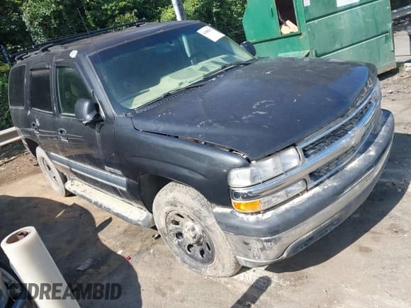 ✅ 2003 Chevrolet Tahoe LS • VIN: 1GNEC13V53R214113 • Lot: 42880317. Listed on IAAI with 264,509 mi. Free auction sales archive from the USA and detailed vehicle history report at DreamBid. Image 1.