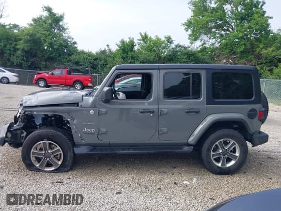 ✅ 2022 Jeep Wrangler Unlimited Sahara • VIN: 1C4HJXEN2NW239826 • Lot: 42497327. Listed on IAAI with 36,754 mi. Free auction sales archive from the USA and detailed vehicle history report at DreamBid. Image 13.