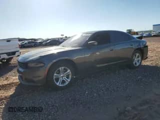 2021 Dodge Charger SXT с VIN 2C3CDXBGXMH533872, выставлен на аукционе Copart как лот 49426125 с пробегом 99 678 миль миль и Списание • Salvage title. История ставок и продаж доступна на DreamBid. Изображение 1.