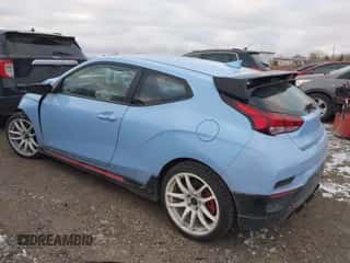2022 Hyundai Veloster z VIN KMHT36AH3NU013610, wystawiony jako IAAI lot #41427894 z przebiegiem 32 250 mil mil oraz . Historia ofert i sprzedaży dostępna na DreamBid. Obrazek 3.